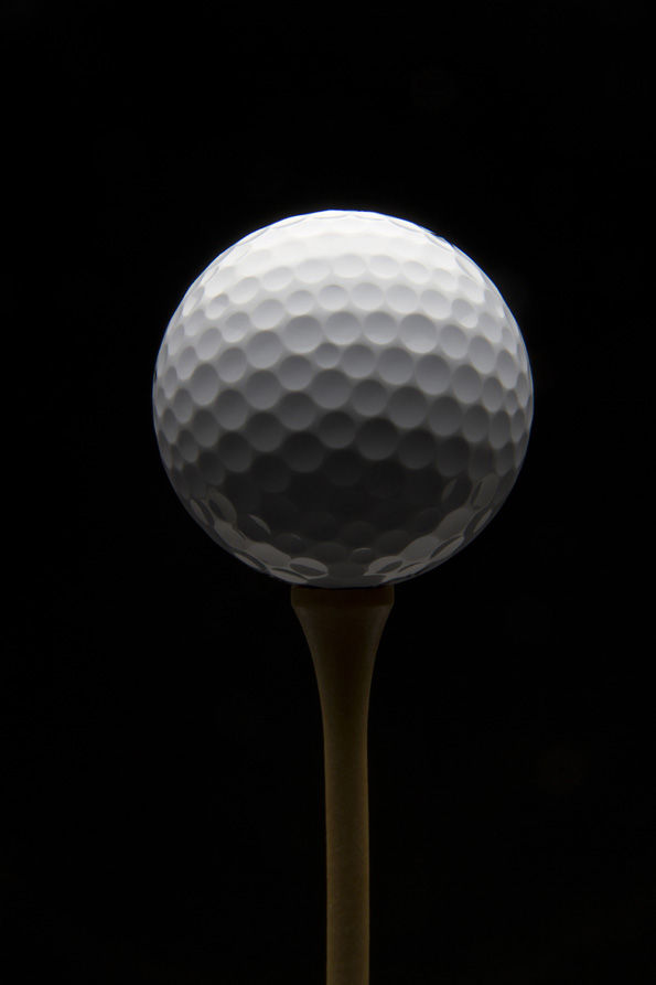Golf ball with black background