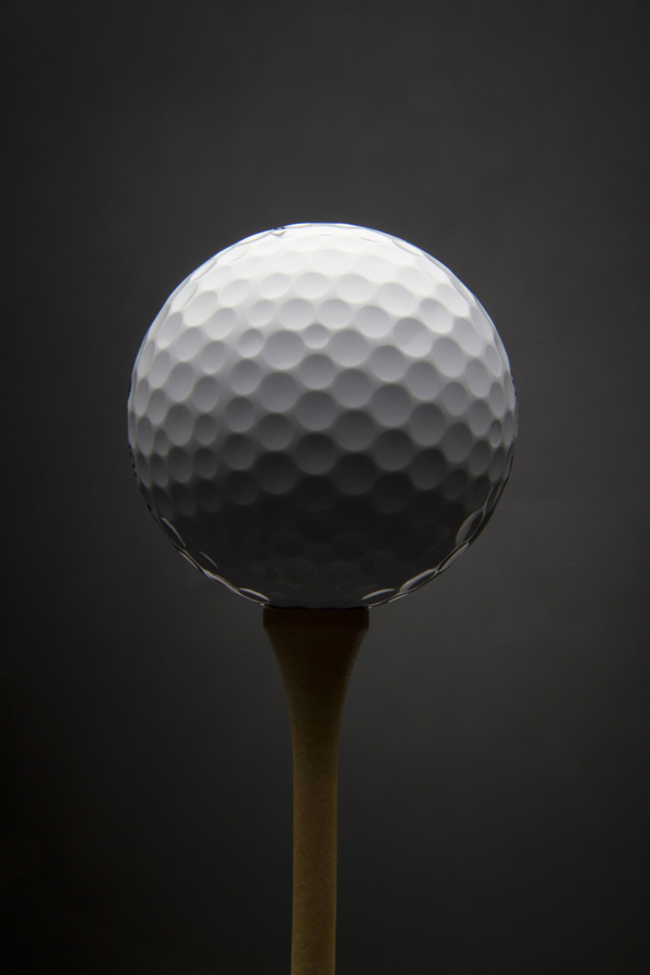 Golf ball with grey background