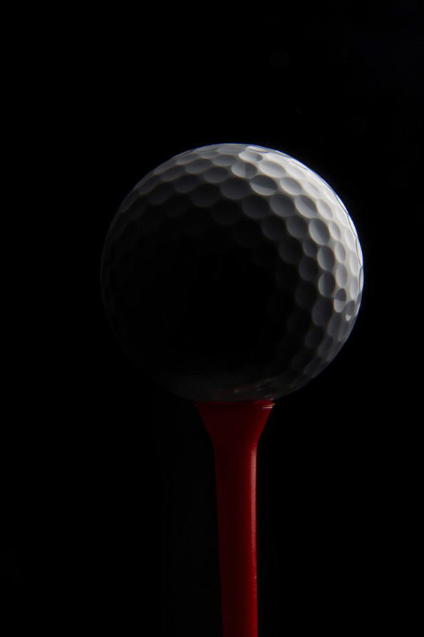 close up of golf ball on a golf tee
