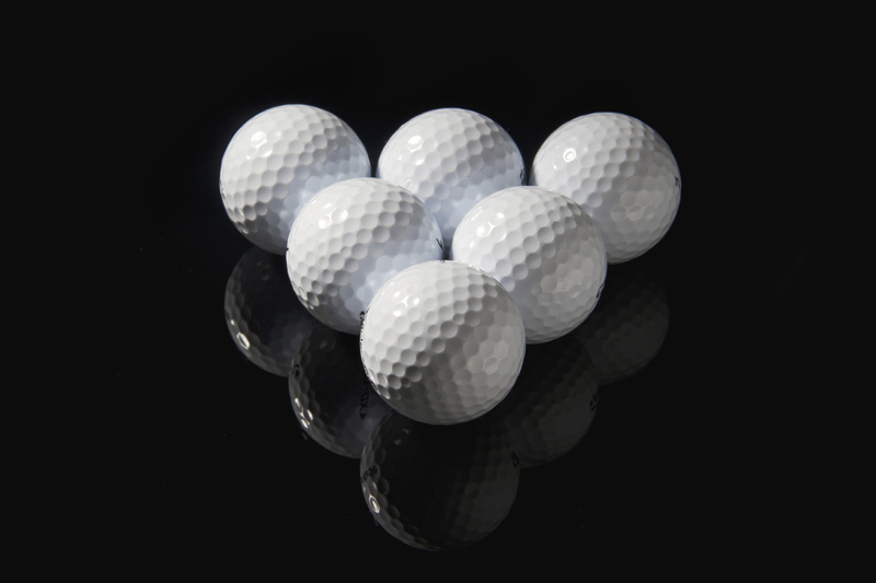 golf balls placed in descending order