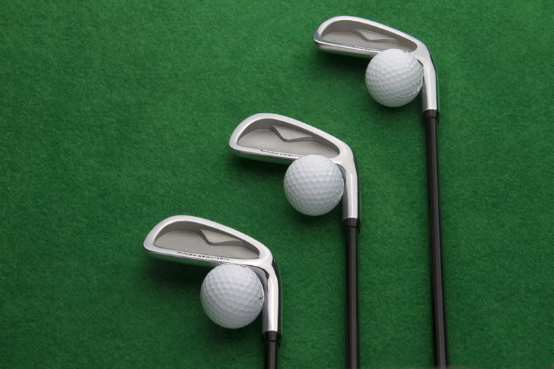 golf clubs with golf balls