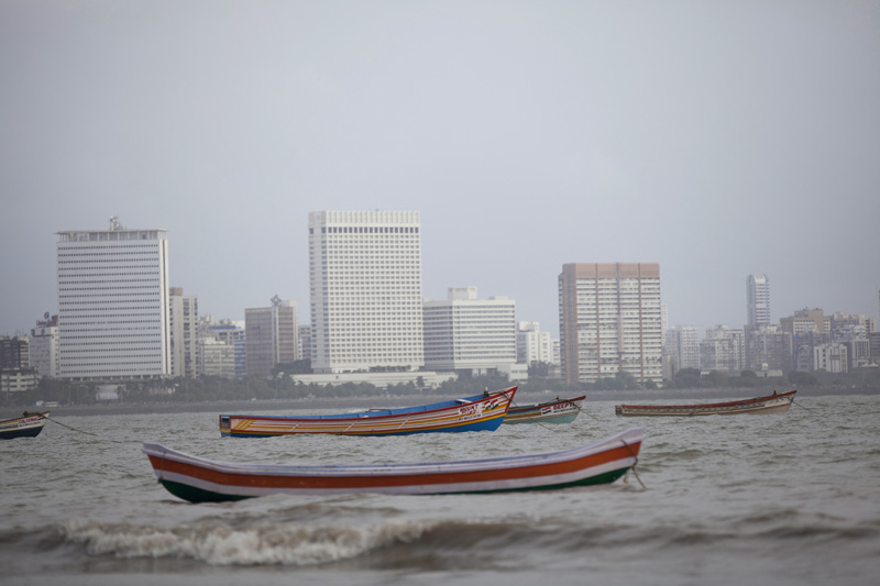 indian boats near the shore at mumbai 
