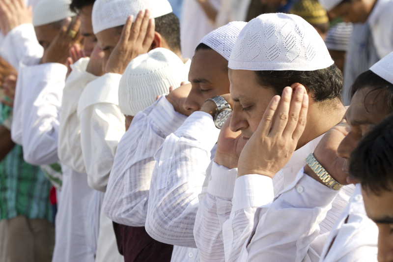 muslim during eid prayer at mosque 