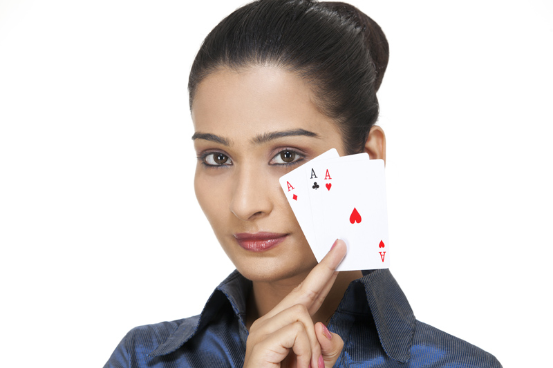 girl posing with playing cards 