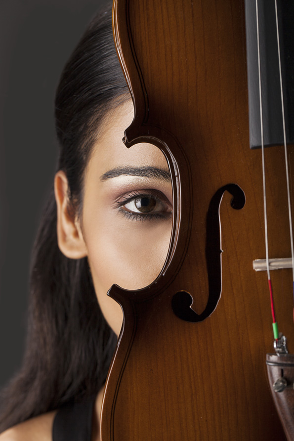 close-up on the eye of a girl with violin