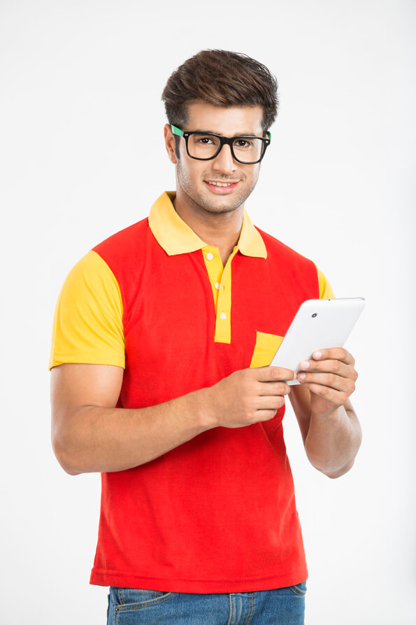 guy smiling and posing with tablet 