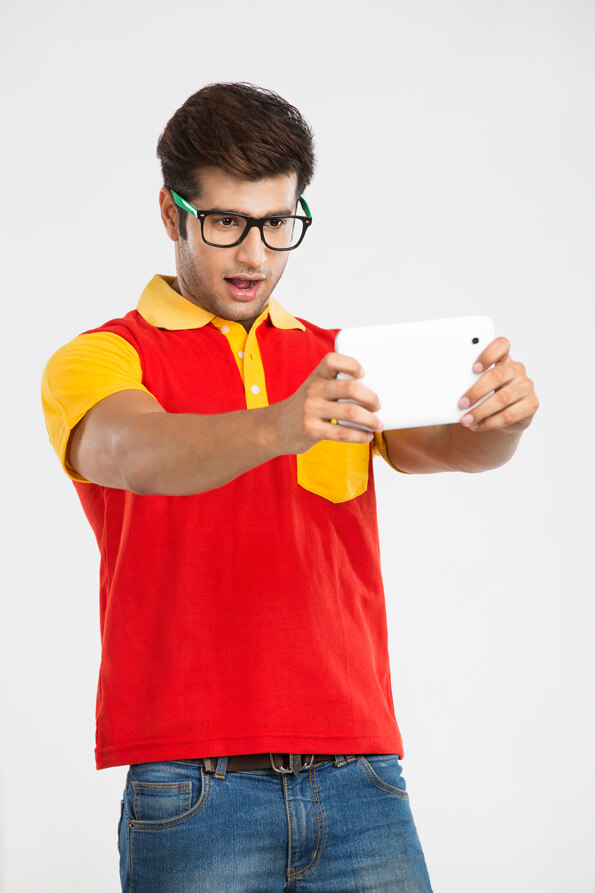 guy posing with tablet 
