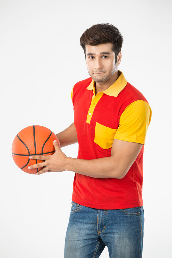 guy playing with basketball