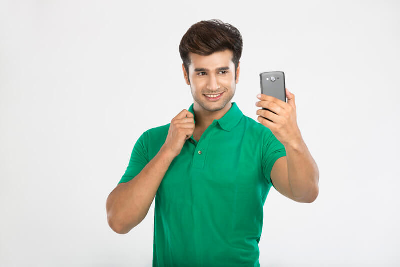 man posing while clicking self picture