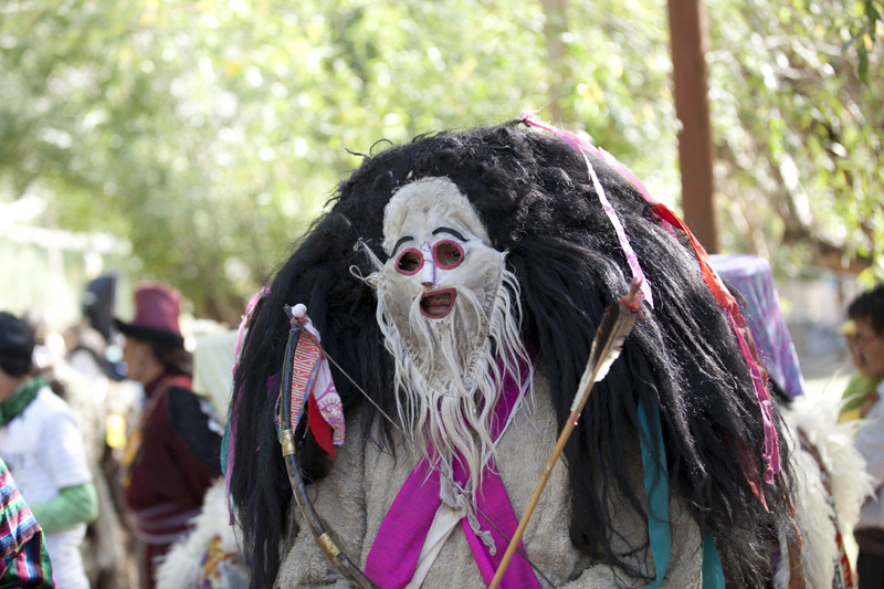 people with traditional masks at the ladakh festival