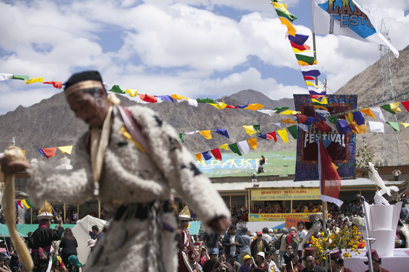 traditional tibetan man performing folk dance