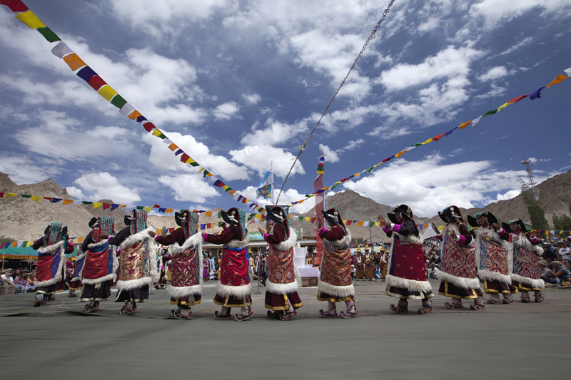 traditional tibetan women performing folk dance