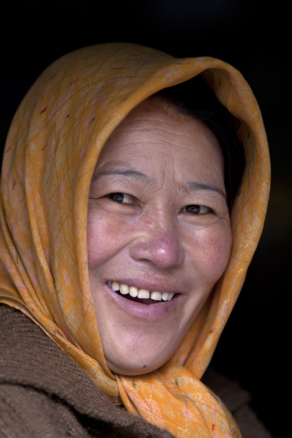 ladakhi woman smiling while looking at the camera 