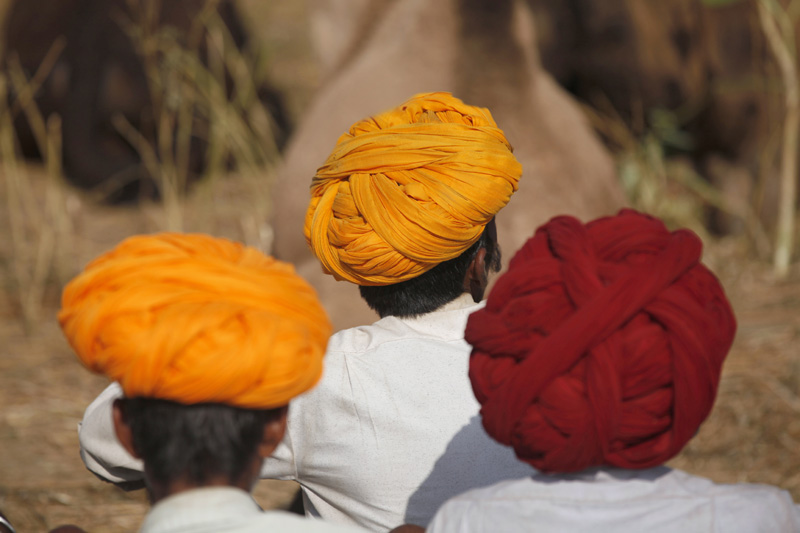 back view of villagers at pushkar mela,rajasthan