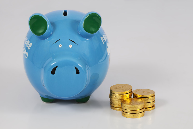 piggy bank with gold coins