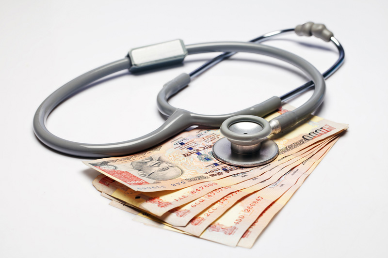 stethoscope and cash