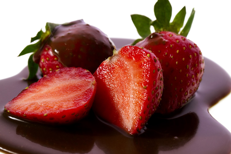 strawberries with chocolate syrup toppings 