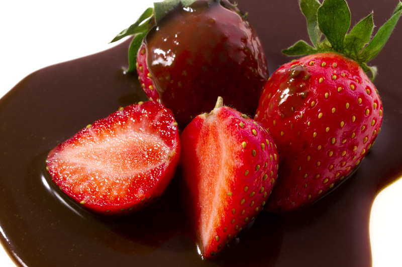 strawberries flavored with chocolate syrup 