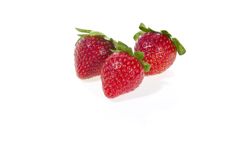 picture of three strawberries with copy space 