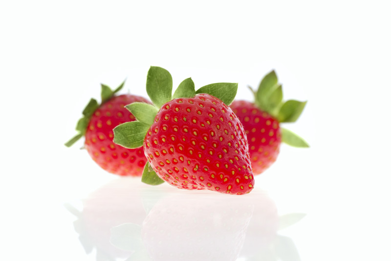 three fresh strawberries 