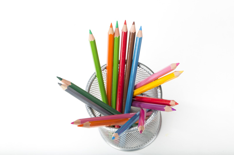 multi coloured pencils in stand 