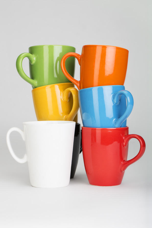 stack of cups against white background 