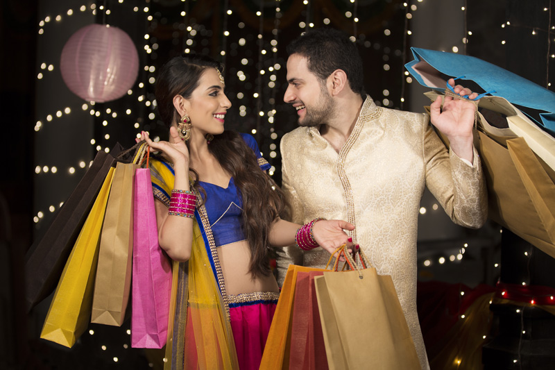 couple doing diwali shopping 