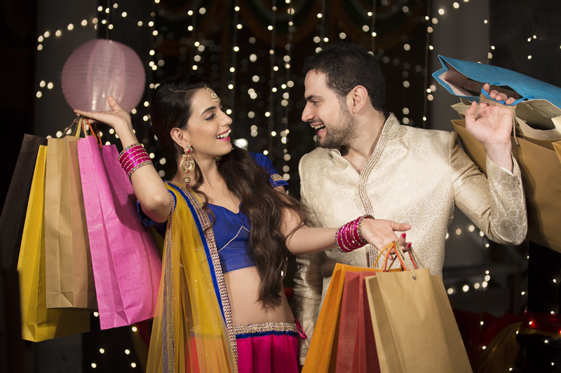 couple posing after diwali shopping