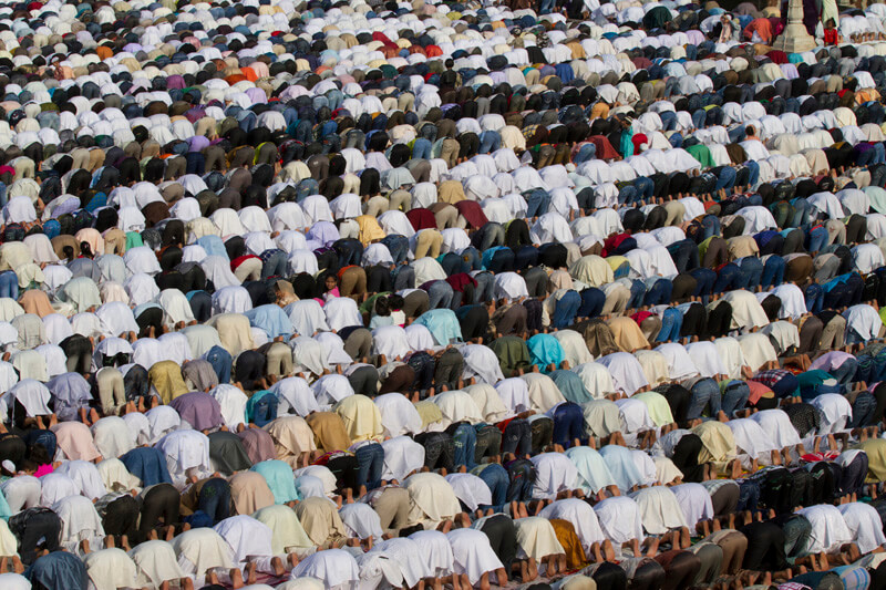 people bowing at mosque during prayer