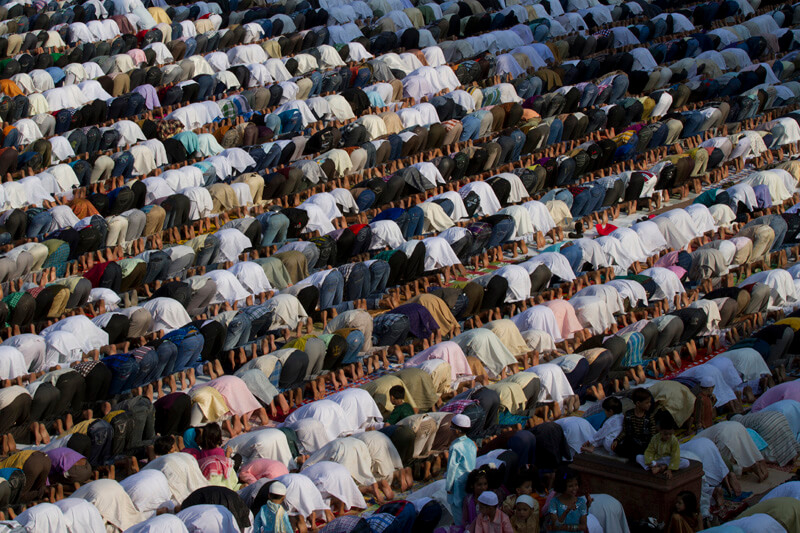 people bow down for prayer at jama masjid 