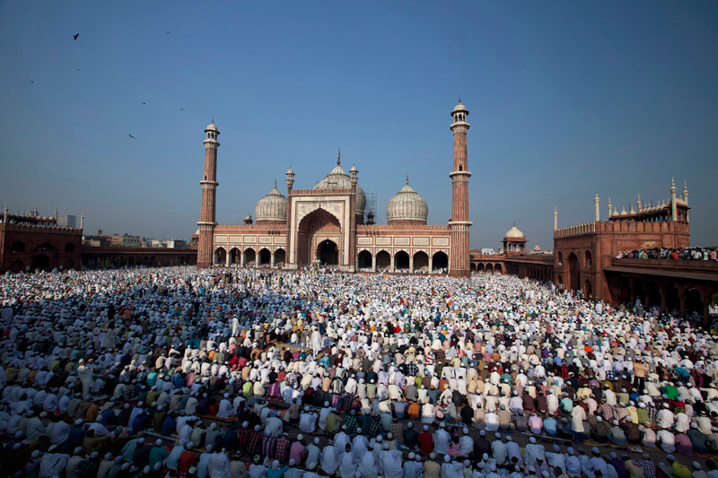 people praying at jama masjid mosque during eid festival