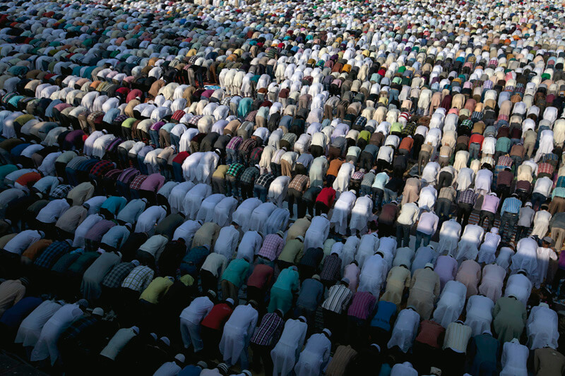 people bowing during prayer meeting at jama masjid 