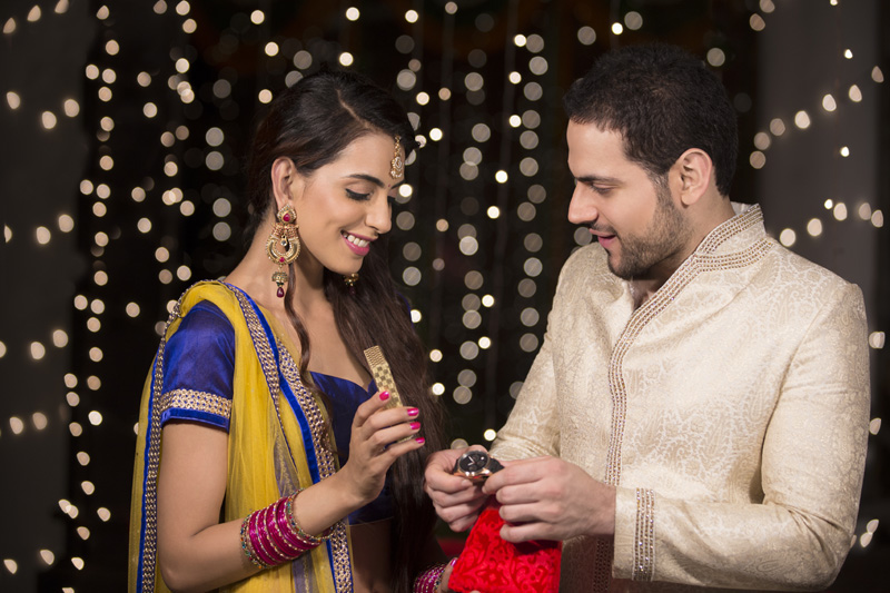 wife gifting watch to her husband on diwali 