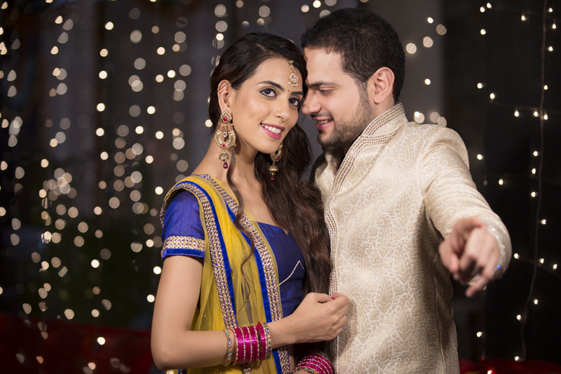 couple in ethnic wear posing at diwali 