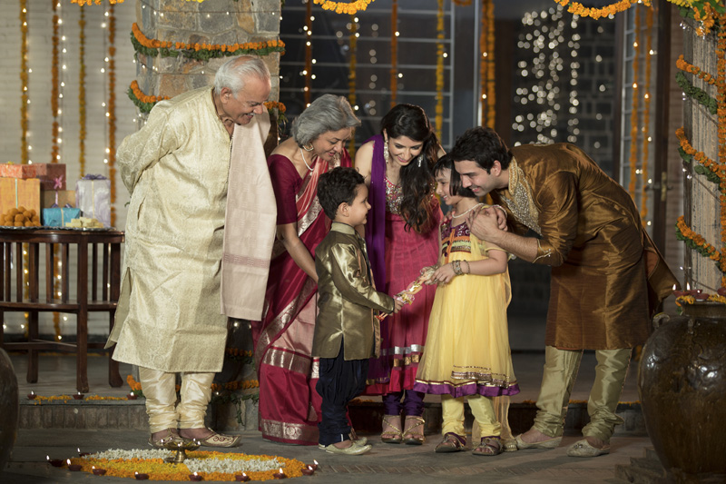 kids exchanging gifts on diwali 