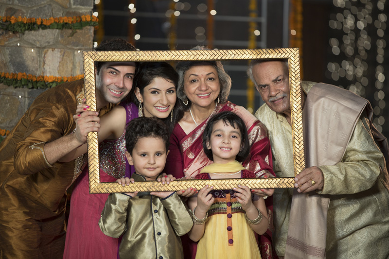 traditional indian famil in a picture frame