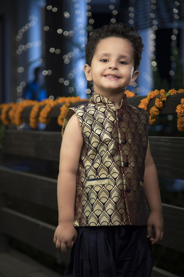 cheerful young boy at diwali