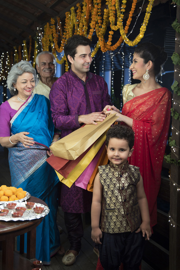 traditional family celebrating diwali