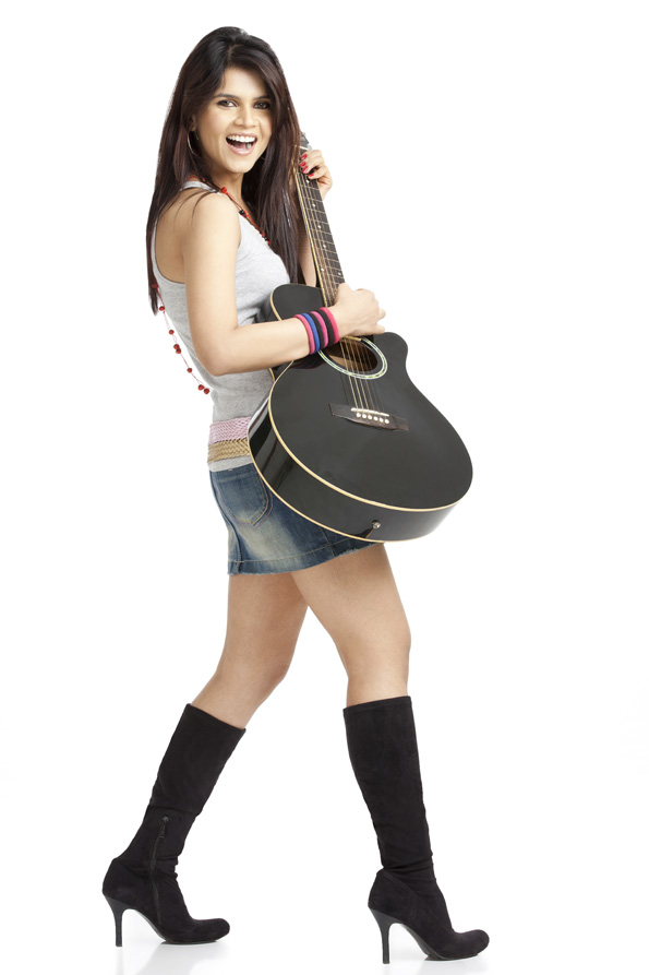 teenager in cool casual clothing with a guitar
