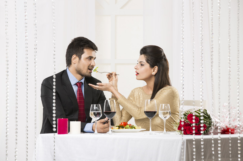 couple on romantic dinner at restaurant