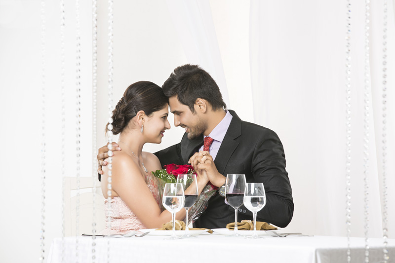 couple romancing on romantic dinner date