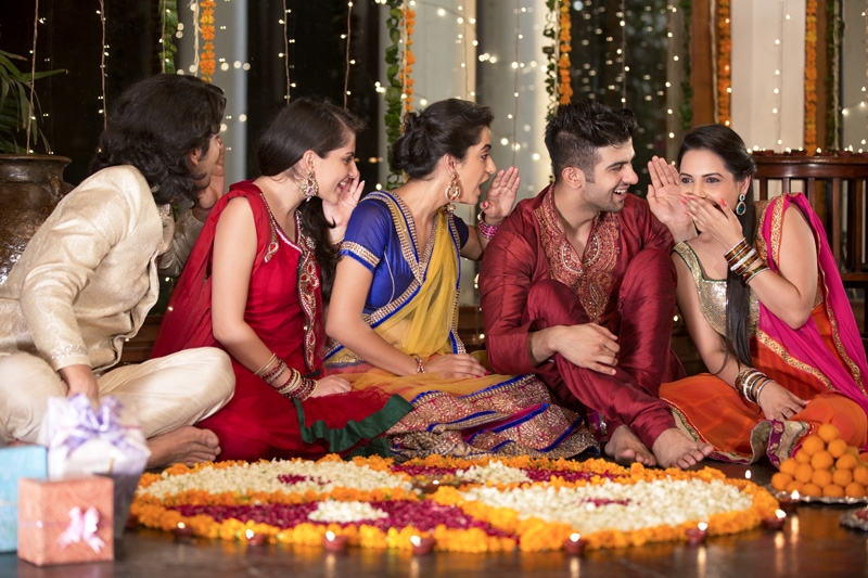 couples gossiping at diwali party