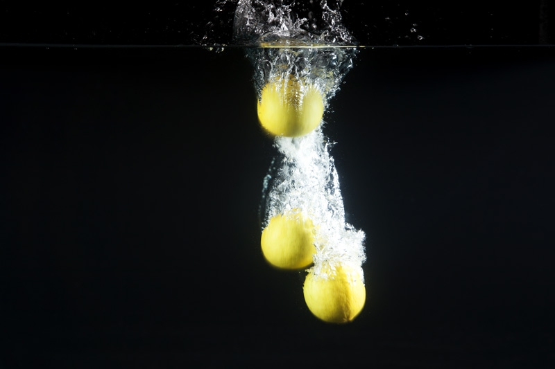 lemons dipped in water   