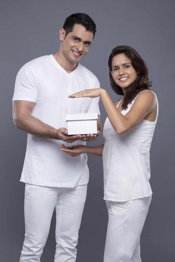 couple holding a gift box