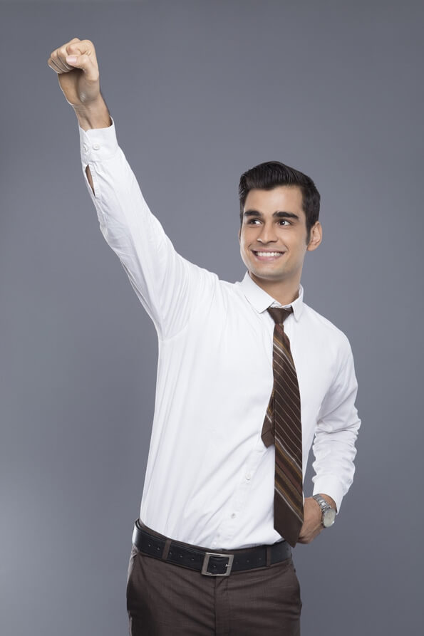 man pointing fist in air 