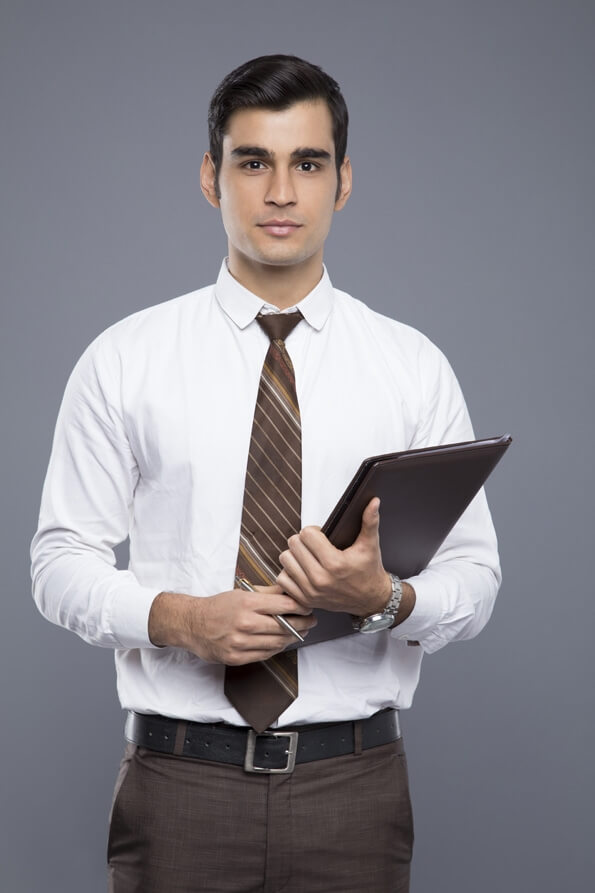 formally dressed man with a file
