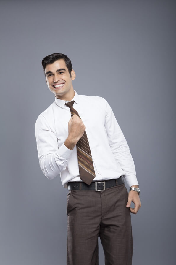 man in formal clothes cheering
