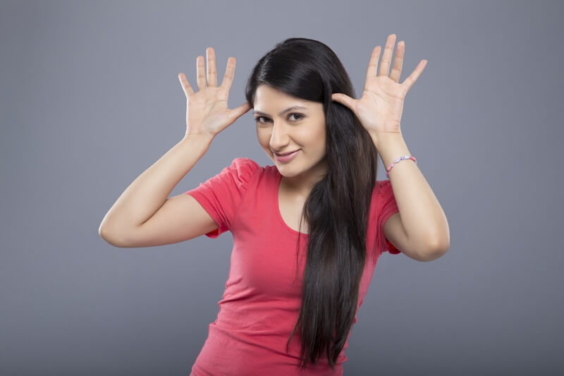 woman posing in funny gestures