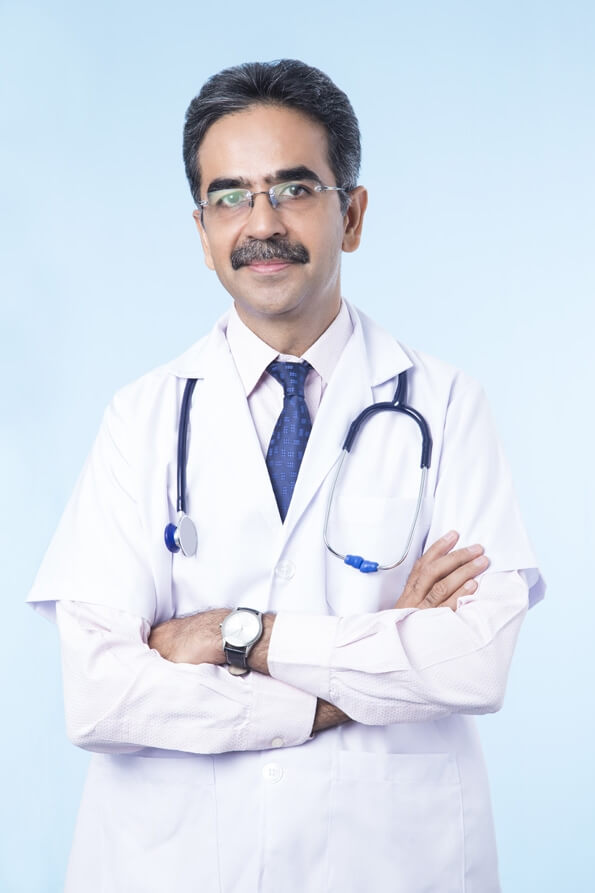 doctor standing with arms crossed 