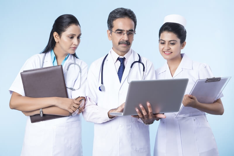 doctors working on laptop 